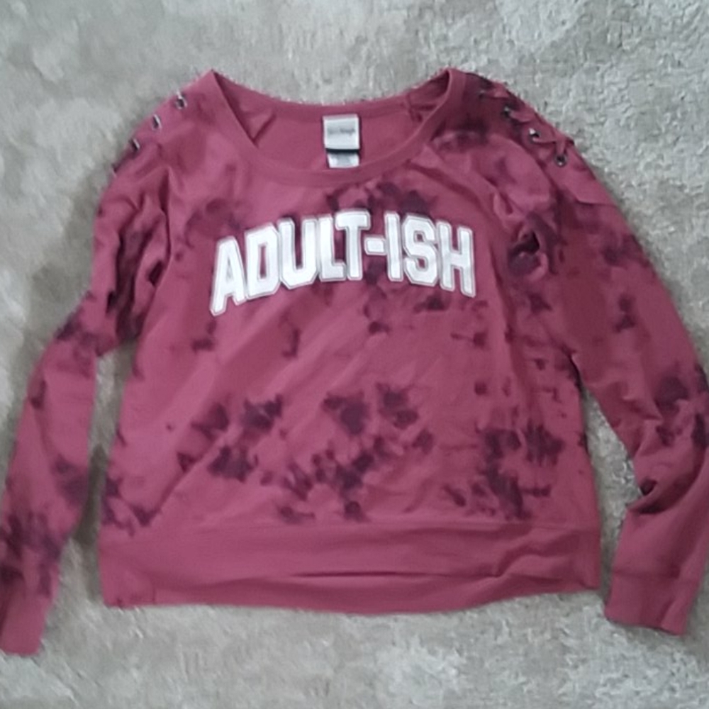 long sleeve shirt with an adultish logo